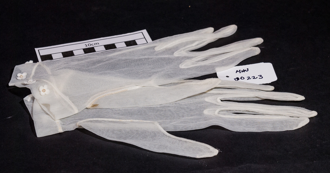 Clothing, lady's cream nylon gloves