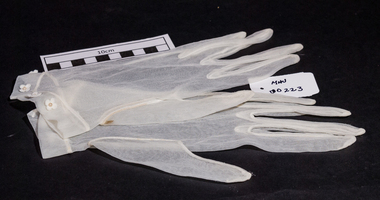 Clothing, lady's cream nylon gloves
