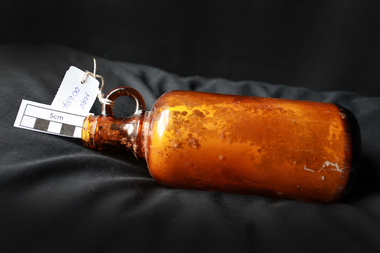 Manufactured Glass, brown bottle, 20th C