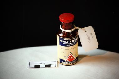 Manufactured Glass, brown bottle 'Tromax', 20thC