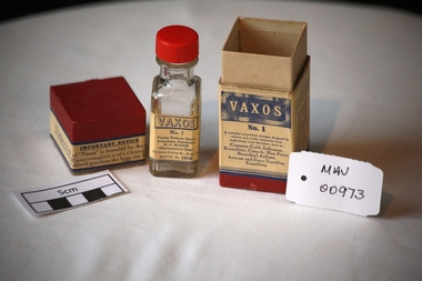 Manufactured Glass, bottle and measure 'VAXOS', 1946