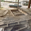 'Box Cottage' dismantled in sections, lying on the floor of the storage building of the Lewis Timber Co Ltd Jasper Road Ormond (1 of 3)