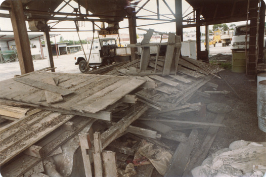 'Box Cottage' dismantled in sections, lying on the floor of the storage building of the Lewis Timber Co Ltd Jasper Road Ormond (2 of 3)