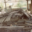 'Box Cottage' dismantled in sections, lying on the floor of the storage building of the Lewis Timber Co Ltd Jasper Road Ormond (3 of 3)