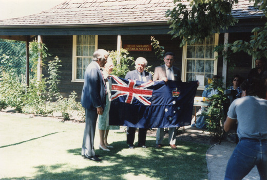 The Australian Flag and the Victorian State Flag presentation at Box Cottage in Joyce Park February 24th 1985 (1 of 4)