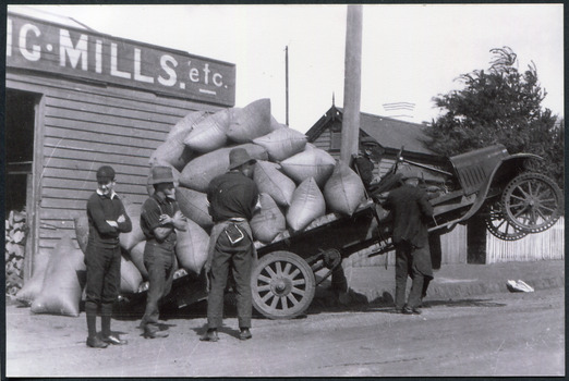 J L Smith, H Higgins Overloaded Ford Truck at Chaff & Grain Store and Mill Bentleigh c1926