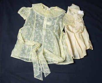 Clothing, Child yellow nylon dress & silk petticoat, c1960