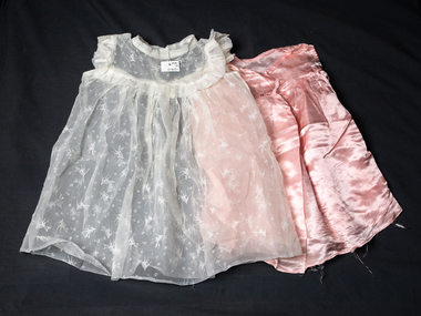 Clothing, Child's white nylon dress & pink silk petticoat, c1960