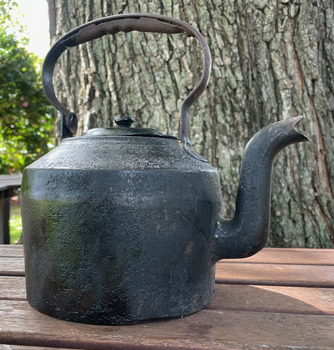Cast iron kettle made by T & C Clark & Sons