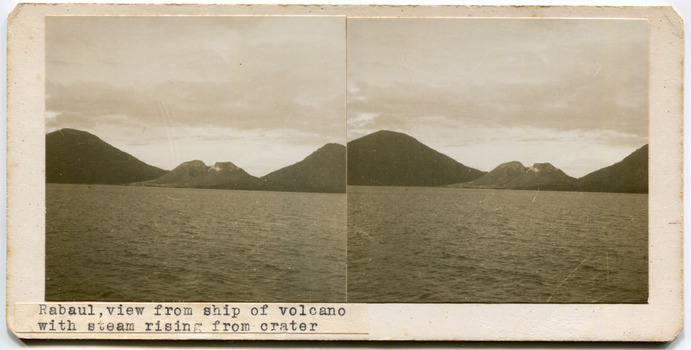 13	Rabaul, view from ship of volcano with steam rising from crater