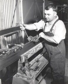 Photograph, Swagging a band saw, n.d