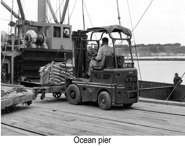 Photograph, Loading bagged goods with a forklift, n.d