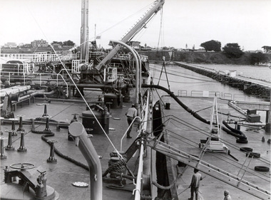 Photograph - Photograph - Petroleum products loaded onto ship, n.d