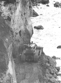 Photograph - Photograph - pushing rocks to form breakwater, c. 1963