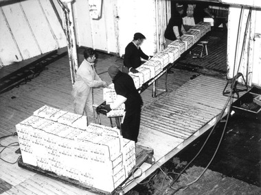 Photograph - Photograph - frozen meat loaded onto ship with with conveyor belt, n.d