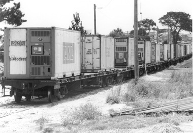 Photograph - Photograph - containers of goods for shipping on cargo train, 1982