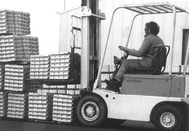 Photograph - Photograph - Lifting cement products with a forklift, n.d