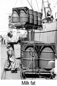 Photograph - Photograph - Barrels being loaded onto ship, n.d