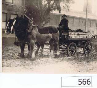 Photograph, Leslie Iredale on brick dray, 1925c