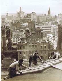 Photograph - Digital image, Workers removing blackout sheets from SLV Dome with Melbourne skyline in background, 1947, 1947_