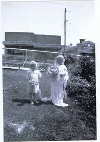 Photograph - Digital Image, Lesley Hills and Lorraine Poulter with Willett's butcher shop in background c1940, 1940c