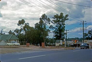 Photograph - Digital Image, R. Max Neumann, Greensborough Anglican Church and Main Street shops 1966, 1966_02