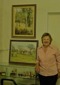 Photograph - Digital Image, June Hall with paintings by Doug Hall, 16/02/2017