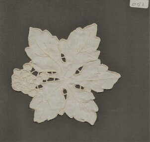 Sample of a cut work doily from this collection.