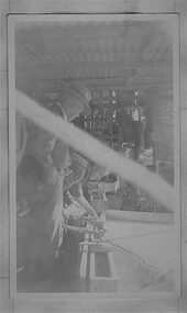 Photograph - Digital Image, Mystery mine photographs: Checking sediment in washing table, 1935c