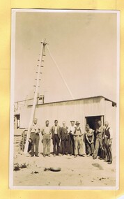 Photograph - Digital Image, Mystery mine photographs: Building staff quarters with men outside, 1935c