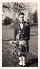 Photograph - Digital Image, David Vickers with bagpipes, 1950s
