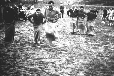 Photograph - Digital Image, Tom Vickers in a sack race, 1950s