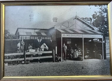 Photograph - Photograph (Framed), Mr & Mrs Medhurst and their children standing outside their fruit shop in Grimshaw Street Greensborough, 1910c