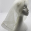 Triangle shaped scarf with Red Cross in centre front. On white foam mannequin head, with white background. Shows translucent nature of fabric.