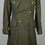 Double breasted Army Khaki coat with brass buttons on manequin with white background.