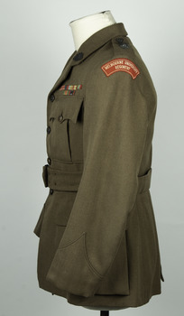 Regimental jacket left side with name patch reading: MELBOURNE UNIVERSITY REGIMENT