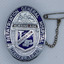 Oval shape silver badge with chain and safety pin