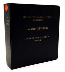 Navy blue hard cover binder with gold embossed lettering. On white background
