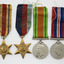 Set of original WWII Medals: L-R 1939-1945 Star; Africa Star, 1939-1945 Defence Medal, 1939-1945 War Medal
