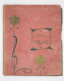 Red cover with flowers and the words Scrap Album