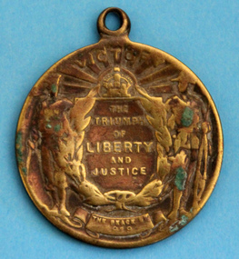 WWI school peace memorial Triumph of Liberty and Justice 1919, Front of Medallion, 1919