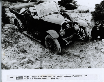 Car bogged in sand. On Great Ocean Road a common event between Eastern View and Fairhaven. Alex Mair