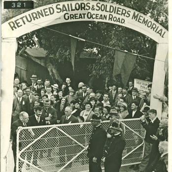 Premier A. A. Dustan opening the GOR tollgate at Shelly Beach, 1936. Under banner of "Returned Sailors and Soldiers Memorial, Great Ocean Road"