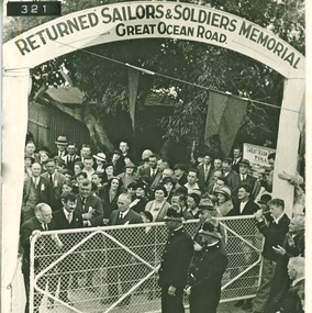 Premier A. A. Dustan opening the GOR tollgate at Shelly Beach, 1936. Under banner of "Returned Sailors and Soldiers Memorial, Great Ocean Road"