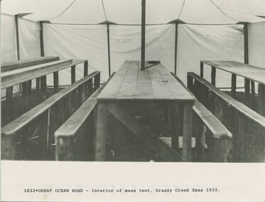 Mess tent interior showing wooden benches and tables Christmas 1933 at Grassy Creek