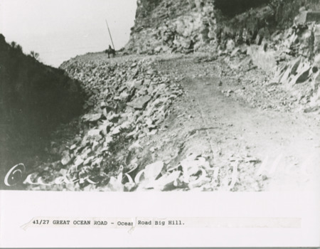 Construction of Great Ocean Road at Big Hill - man on horse visible