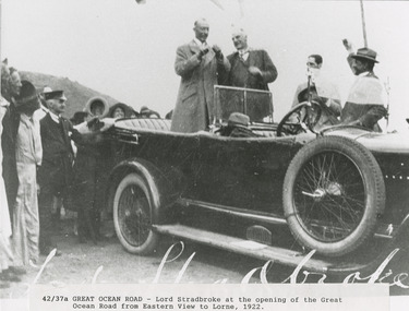 Lord Stradbroke opening section of Great Ocean Road from Eastern View to Lorne 1922. Photo shows two men standing in open top car with others around