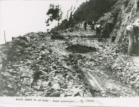 Workers on Great Ocean Road Lorne  men working by hand