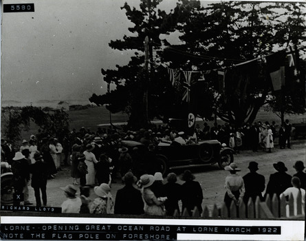 Opening of Great Ocean Road at Lorne March 1922 showing officials in open car driving beneath bunting