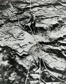 Photograph - Photograph of worker on rock face Great Ocean Road, Worker on rock face on Great Ocean Road